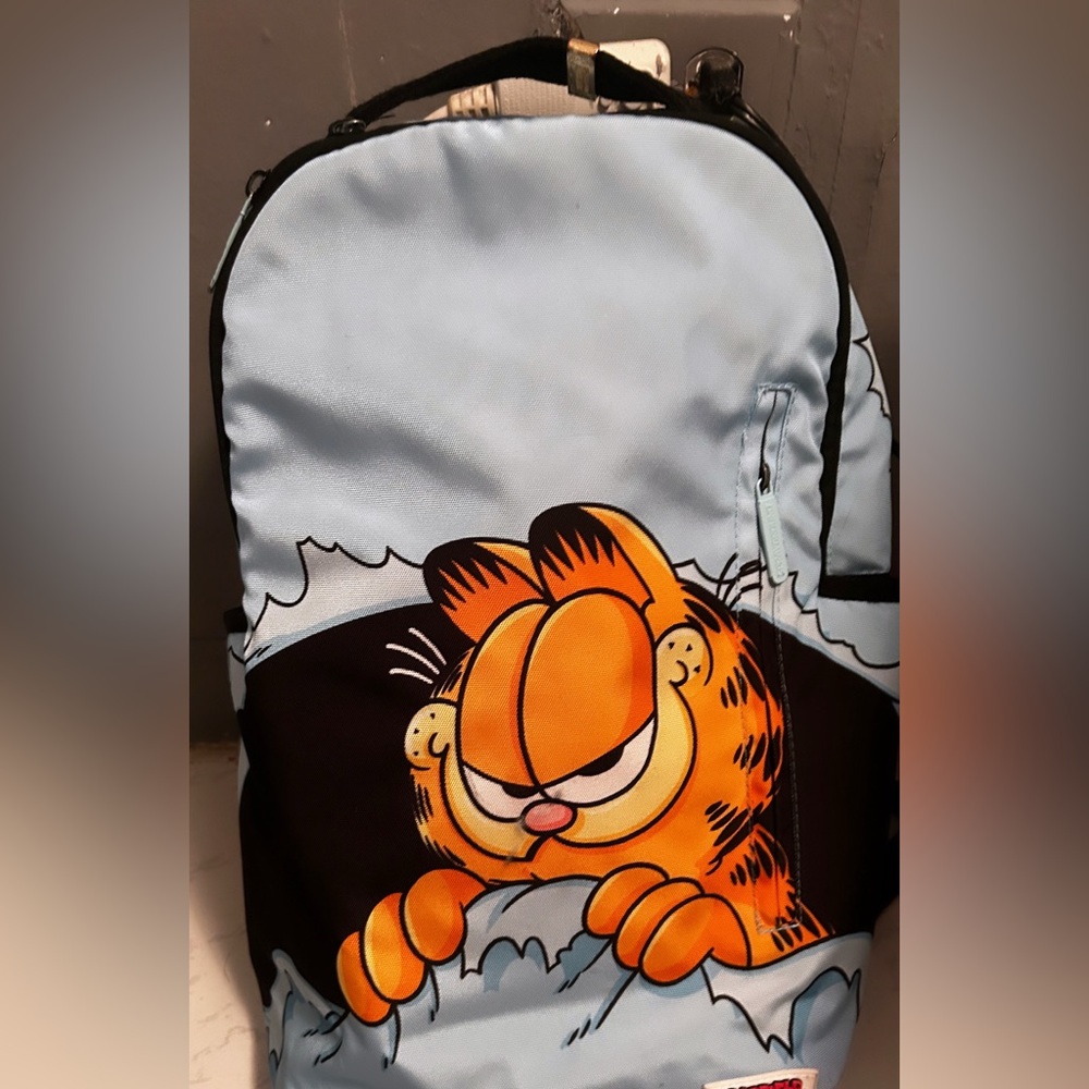 Sprayground Blue and Black Backpack with Iconic Design